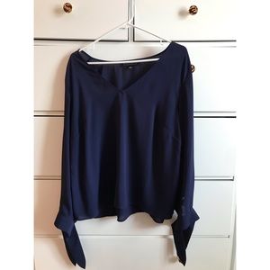 navy blue blouse with tie sleeves